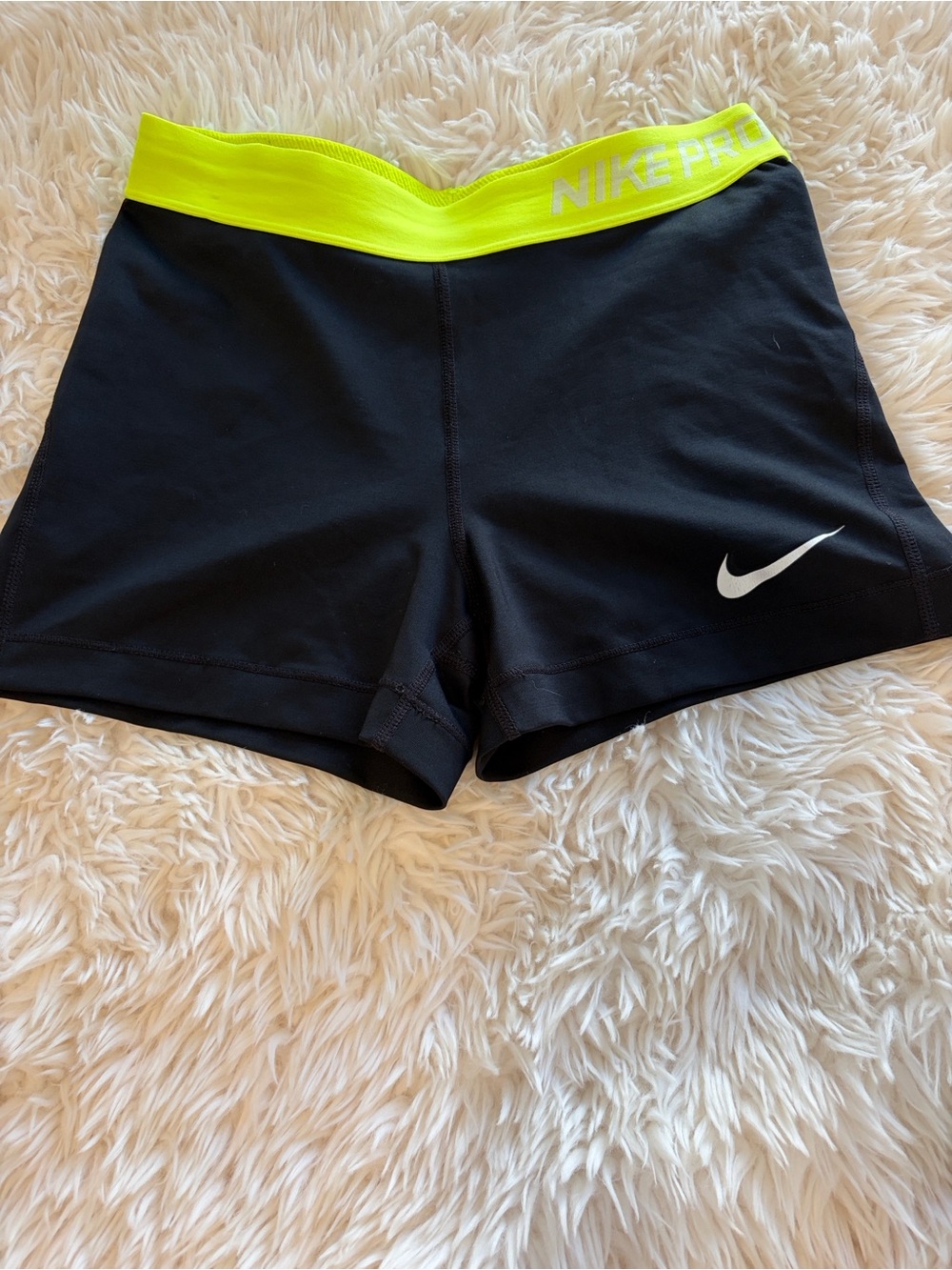 Nike Women's Black Athletic Shorts with Neon Yellow Waistband